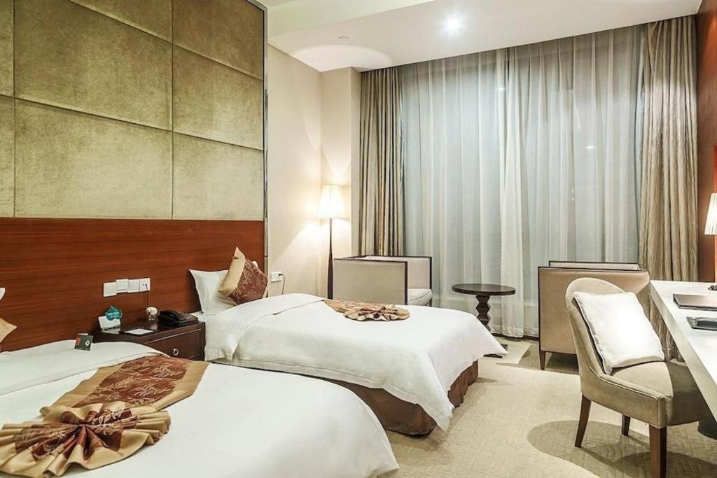 Zhangjiagang Suzhou Phoenix Hotspring Resort מראה חיצוני תמונה